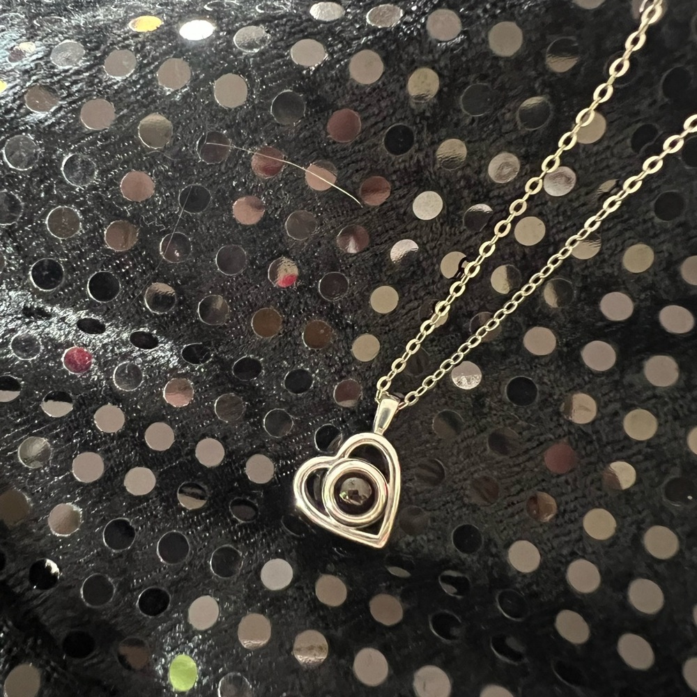 #28  Silver In Color Heart Necklace